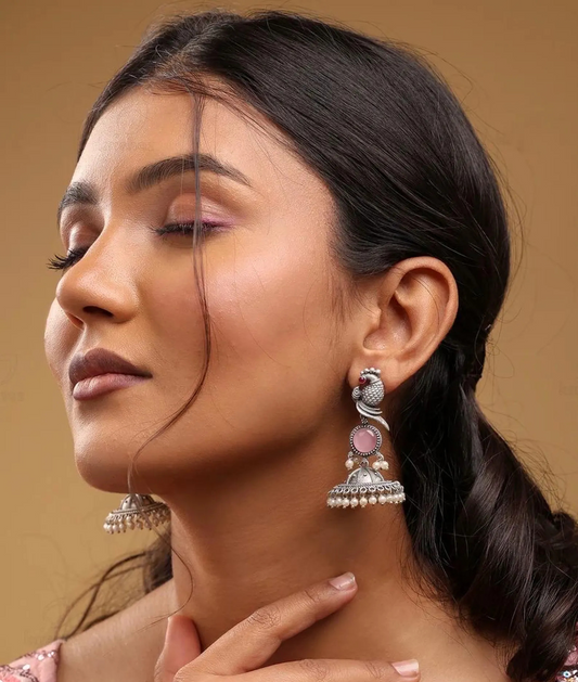 Oxidized Silver Peacock Jhumka Earrings with Purple Stone & Pearl Detailing
