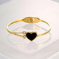 Elegant Gold-Plated Bracelet with Black Heart