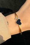 Elegant Gold-Plated Bracelet with Black Heart
