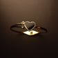 Elegant Gold-Plated Bracelet with Black Heart
