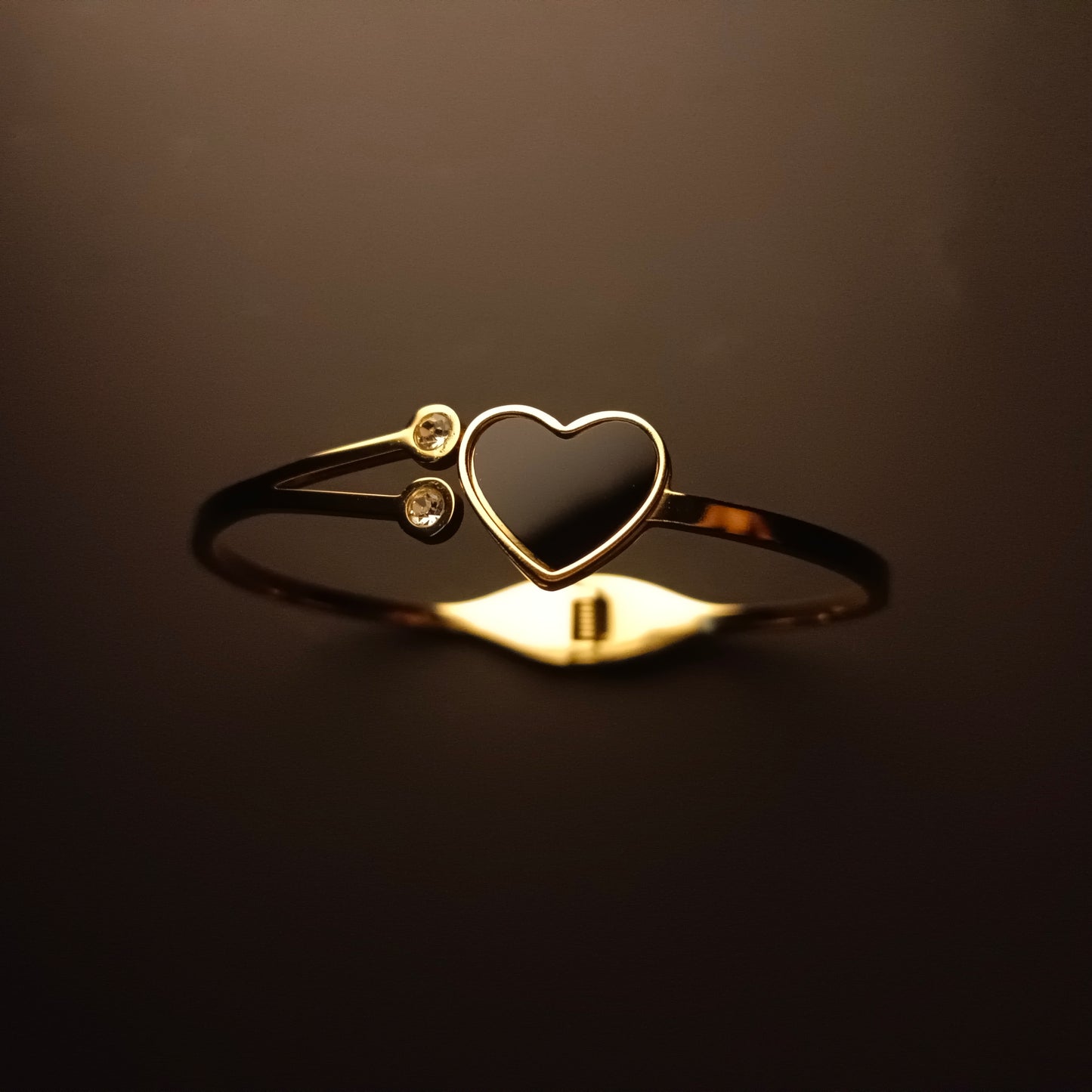 Elegant Gold-Plated Bracelet with Black Heart
